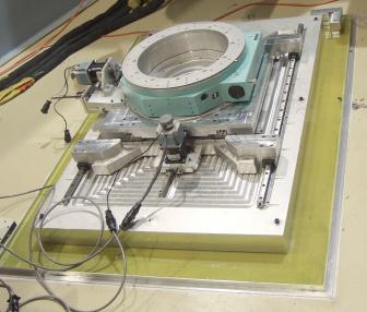 The 2-theta goniometer is attached to the base assembly.