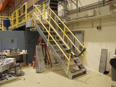 The stair extension and new safety rails are added.
